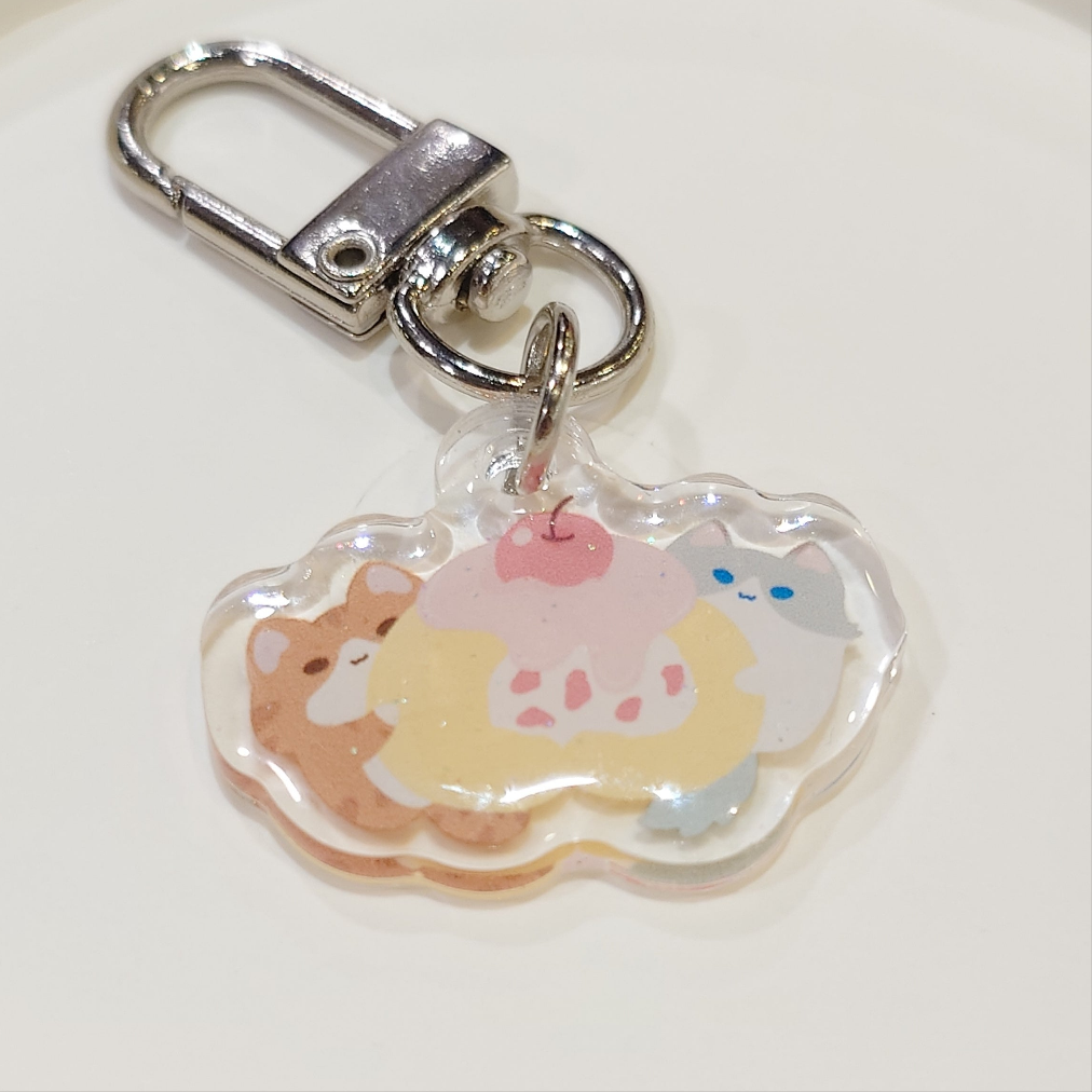 Cake Roll Kitty Epoxy Keychain
