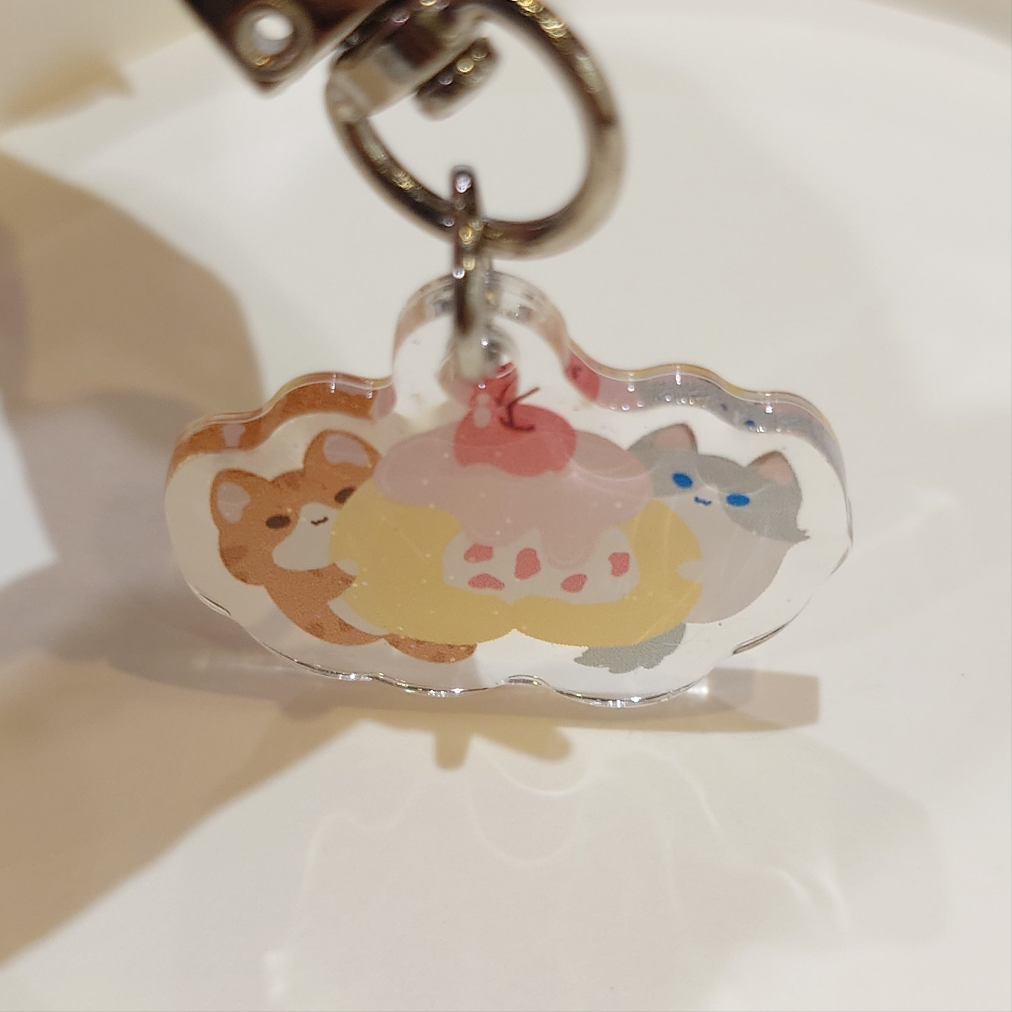 Cake Roll Kitty Epoxy Keychain