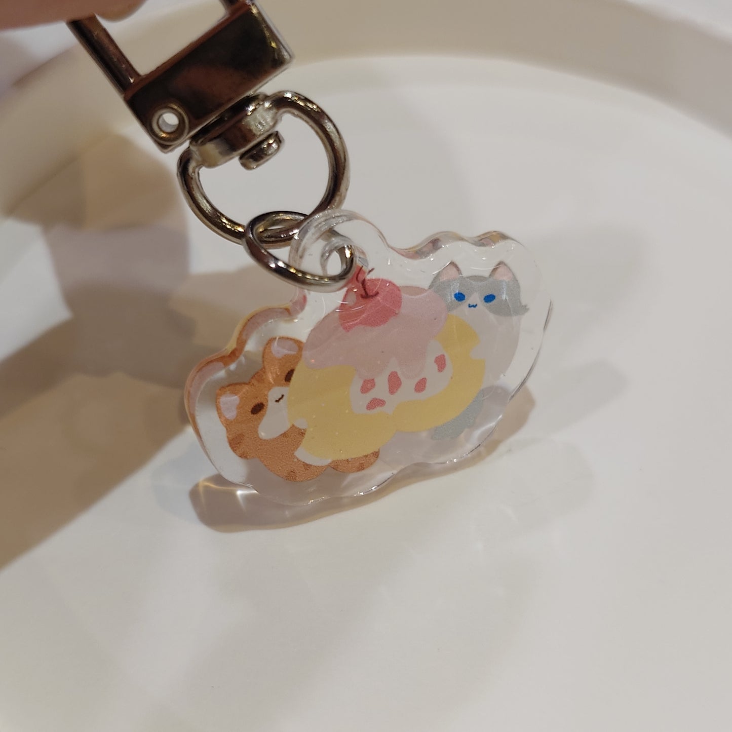 Cake Roll Kitty Epoxy Keychain