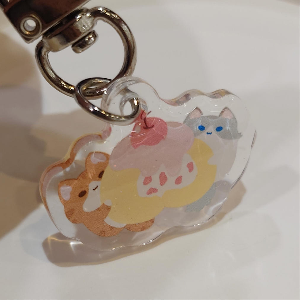 Cake Roll Kitty Epoxy Keychain
